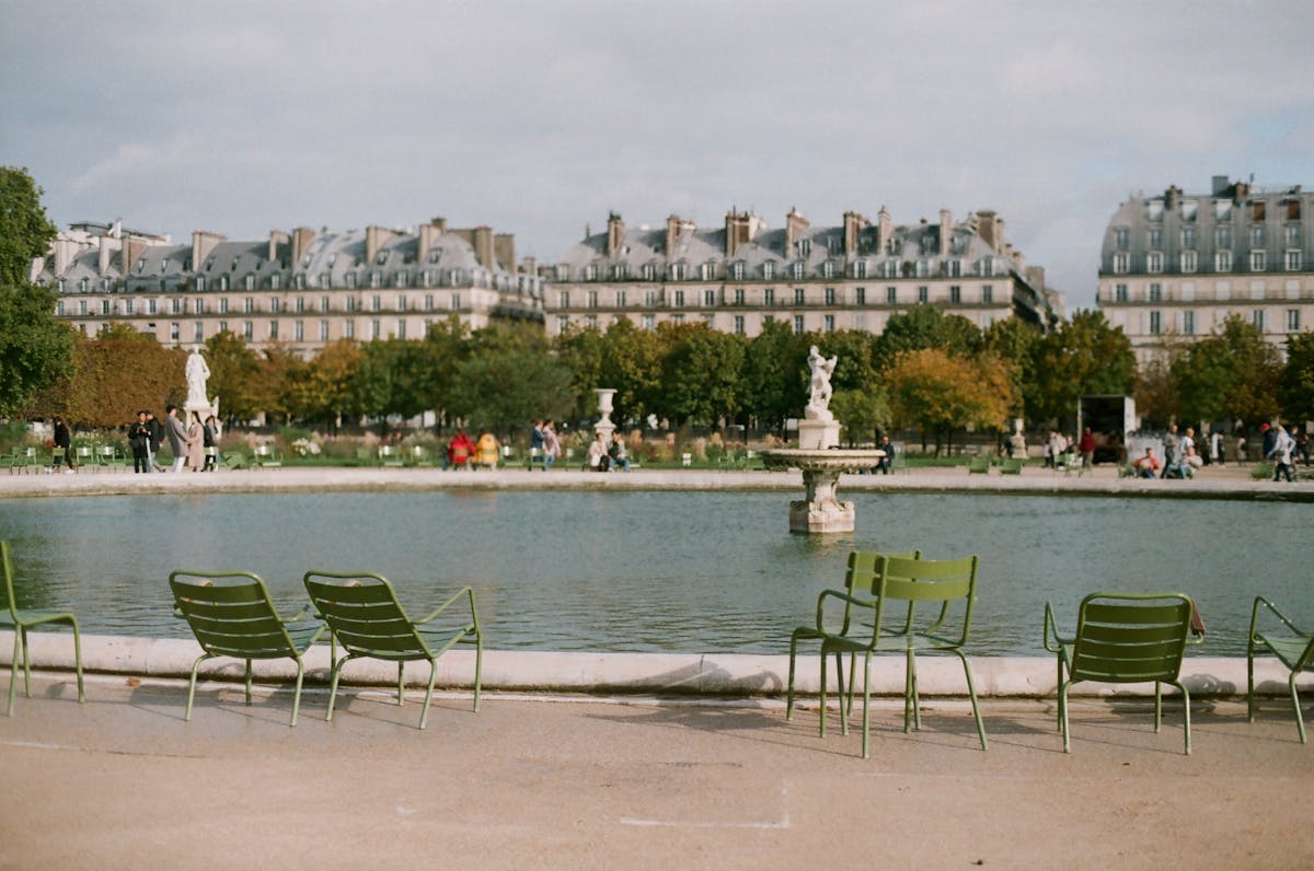 Green chairs and fountain in the Tuileries Garden, Paris
