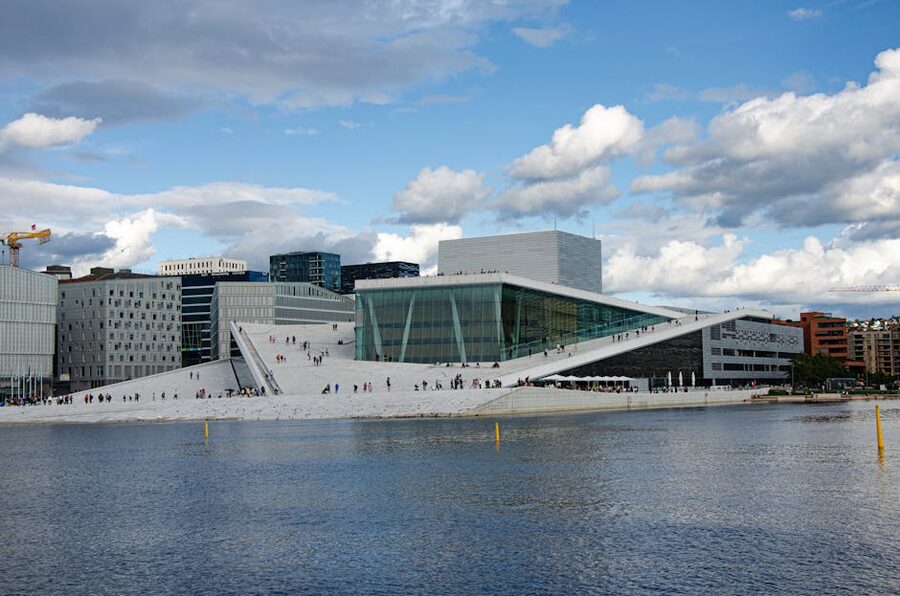 Oslo Opera House under blue sky waterfront