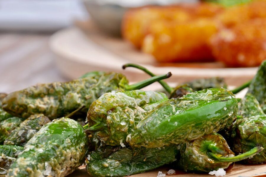 Roasted padron peppers sprinkled with coarse salt