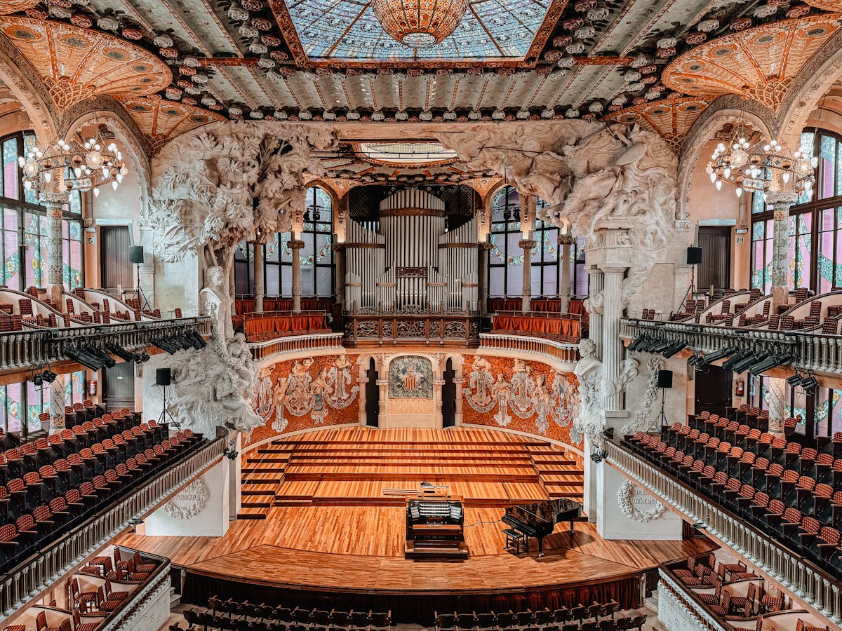 Detailed architectural elements of the Palau de la Musica Catalana exterior showing Modernista sculpture and stonework