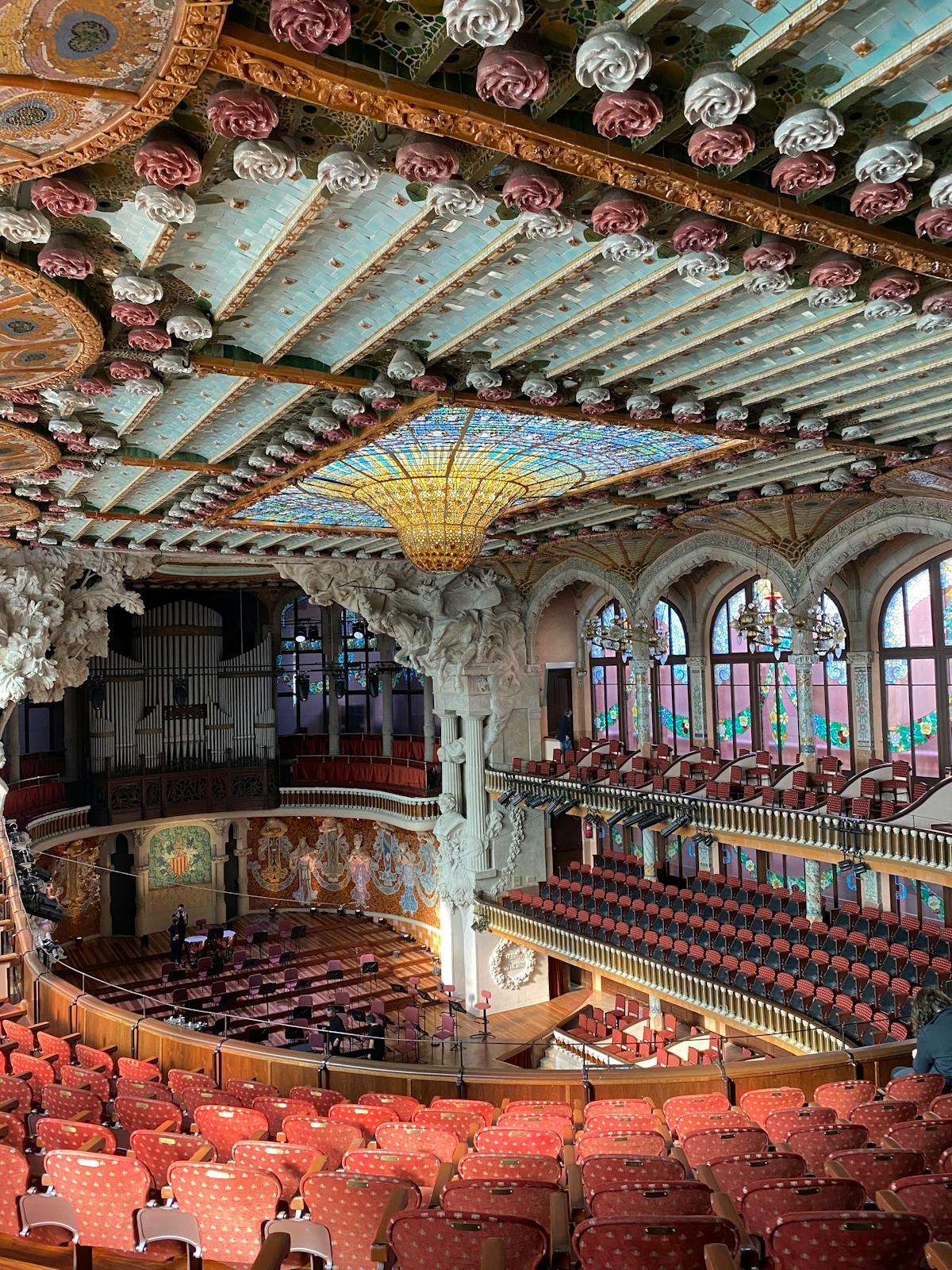 Ornate ceiling of the Palau de la Musica Catalana concert hall showing detailed Modernista decorations