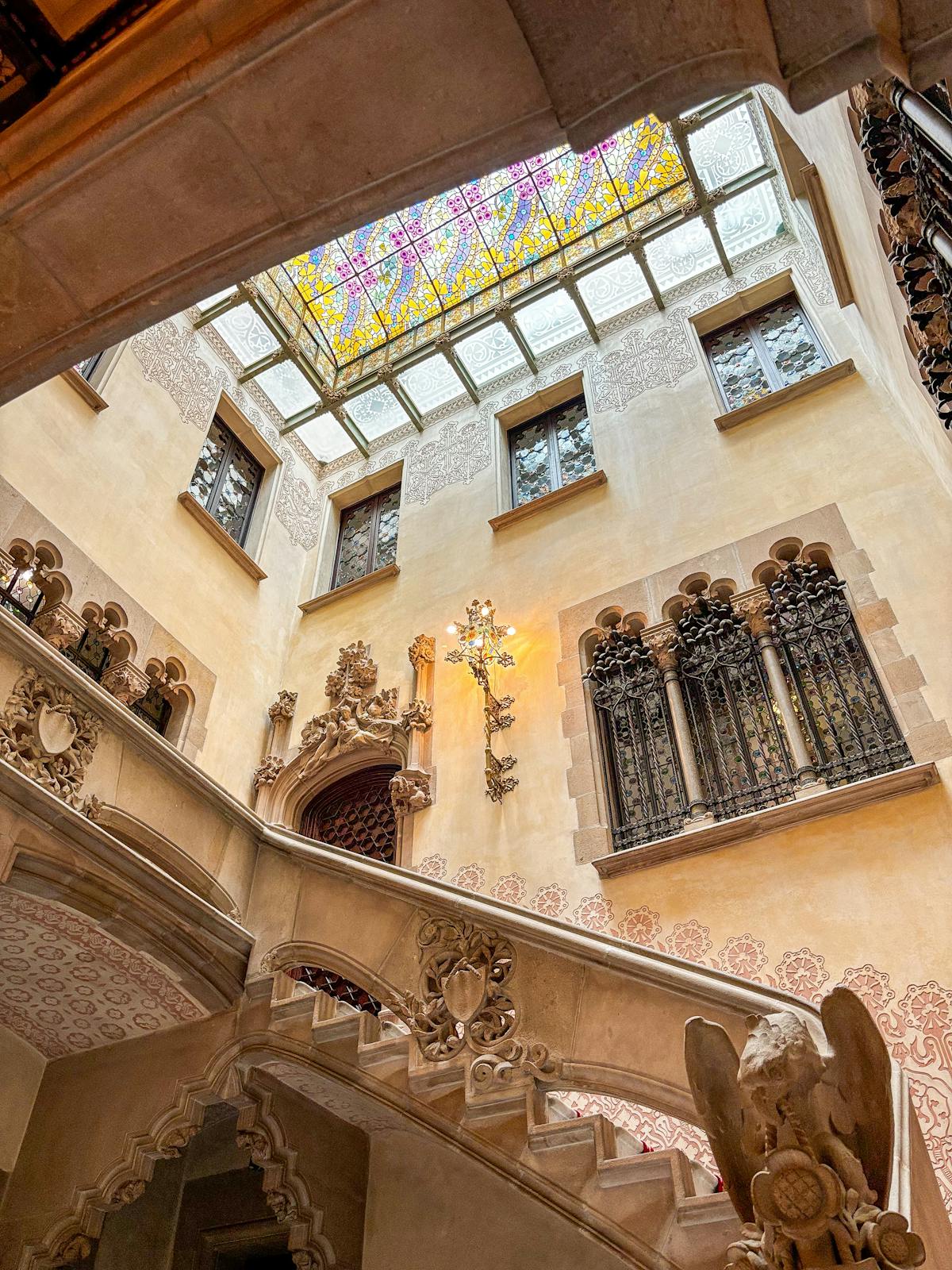 Courtyard space at Palau de la Musica Catalana showing a blend of Gothic and Art Nouveau architectural styles