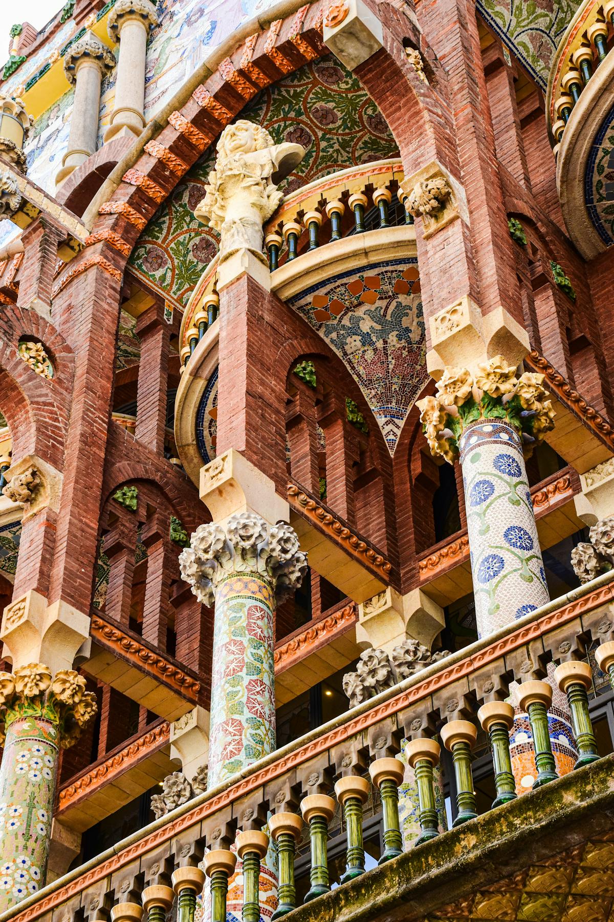 Detailed mosaic and brickwork on the exterior of Palau de la Musica Catalana