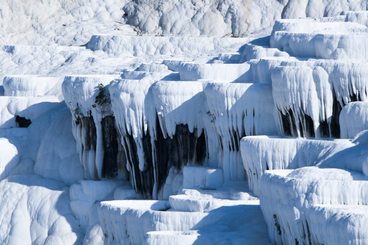White travertine terraces of Pamukkale filled with turquoise mineral water