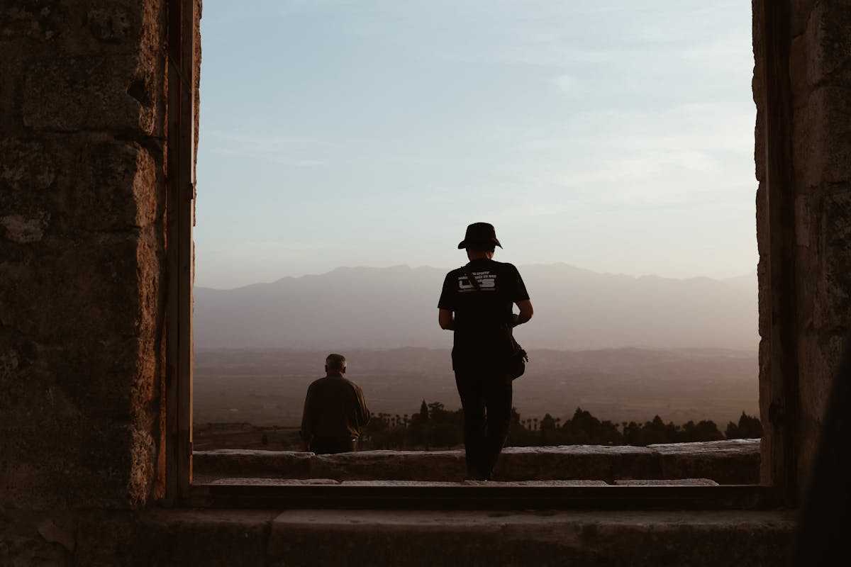 Dramatic sunset view over Pamukkale travertine pools and countryside