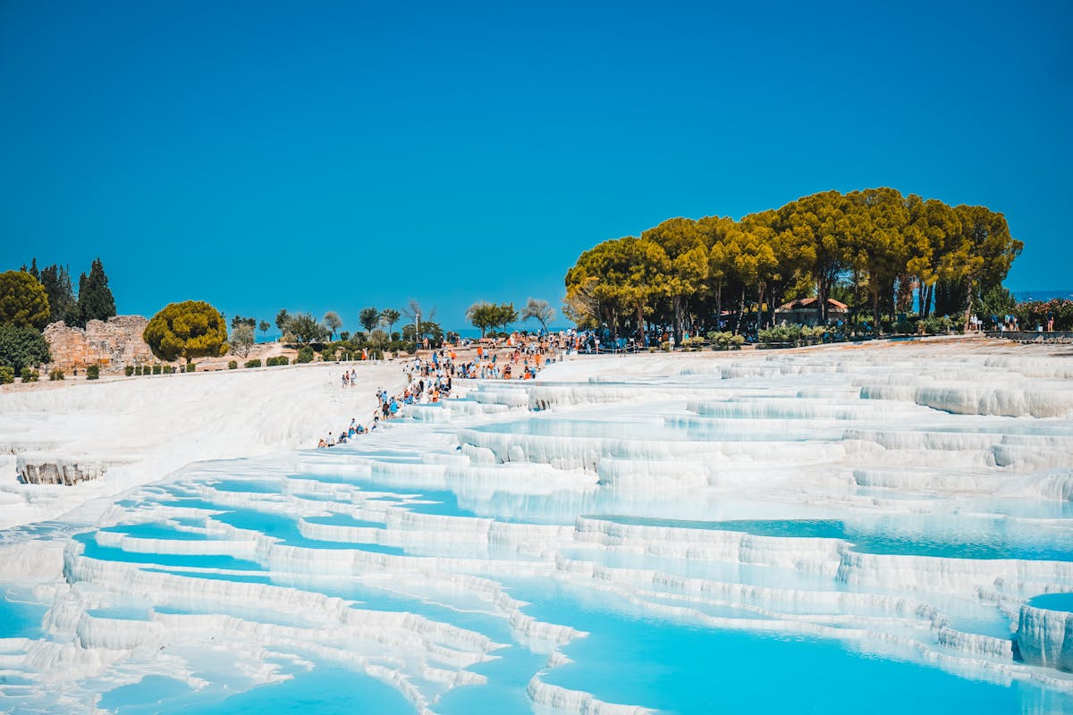 White calcium terraces at Pamukkale Turkey filled with turquoise thermal water