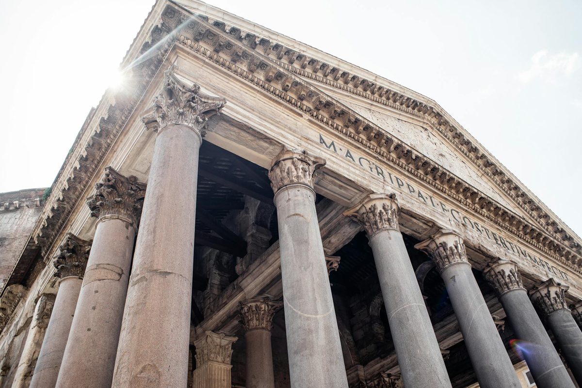 The Pantheon portico with Latin inscription and granite columns in Rome