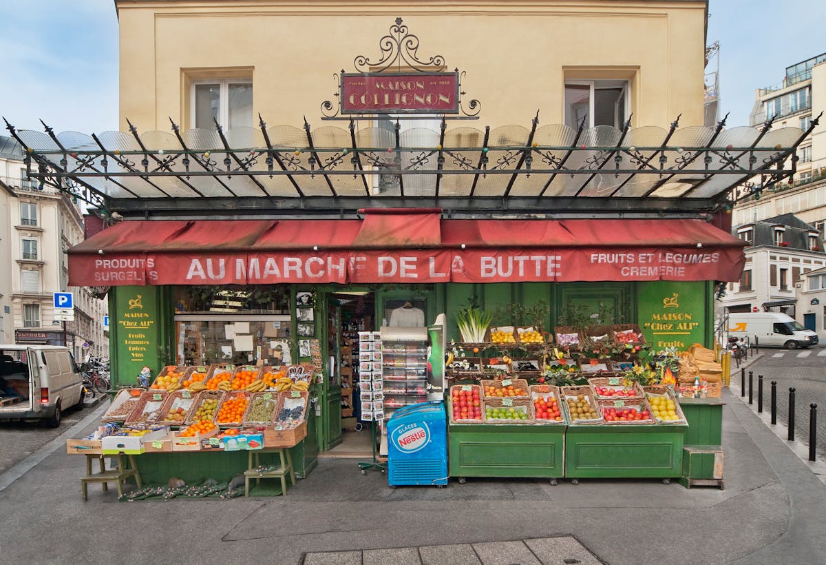 Fresh produce on display at Maison Collignon market in Paris