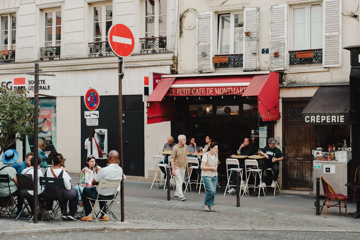 Outdoor cafe in Montmartre Paris with diners