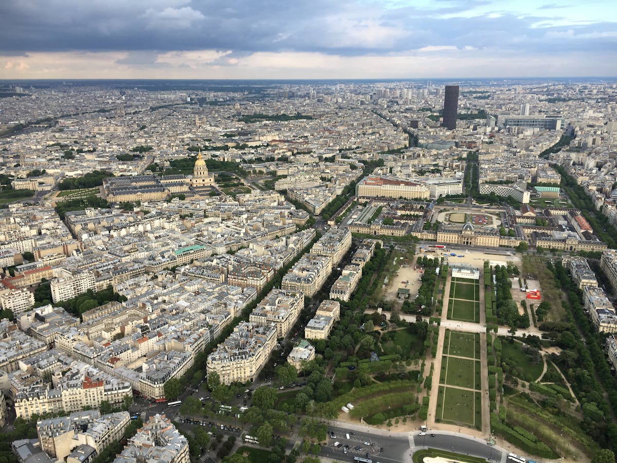 Stunning aerial view of Paris showing the Seine River and famous landmarks across the city