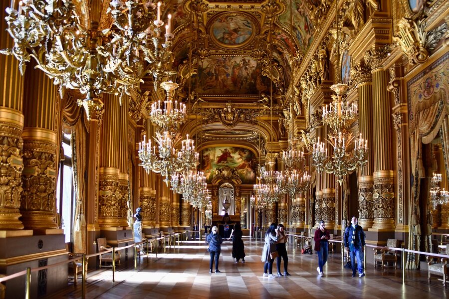 Ornate interior of the Palais Garnier opera house in Paris with gold decoration
