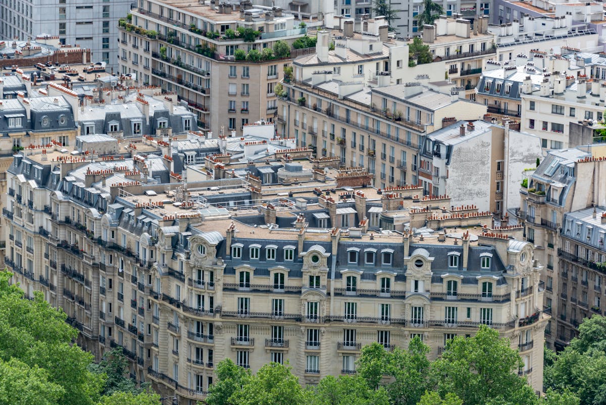 High angle view of classic Haussmannian rooftops and facades in Paris