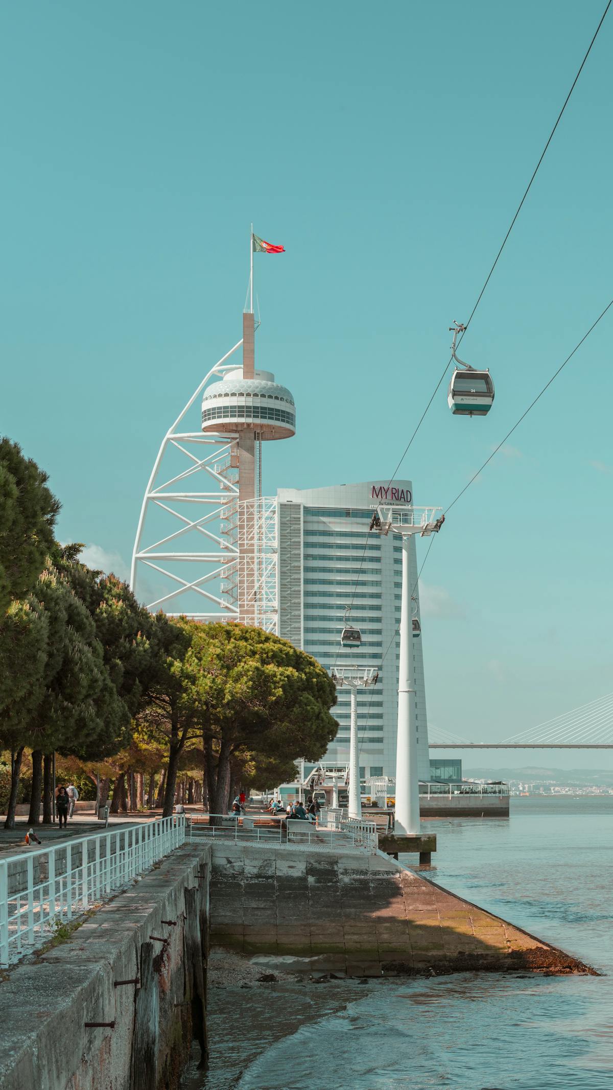 The cable car system and Vasco da Gama Tower at Parque das Nacoes in Lisbon on a sunny day