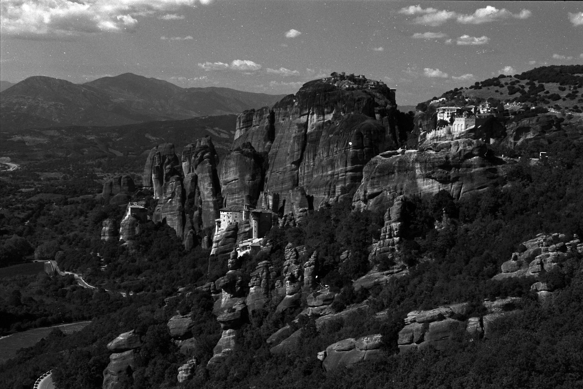 Black and white photograph of Meteora UNESCO world heritage site rock formations in Greece
