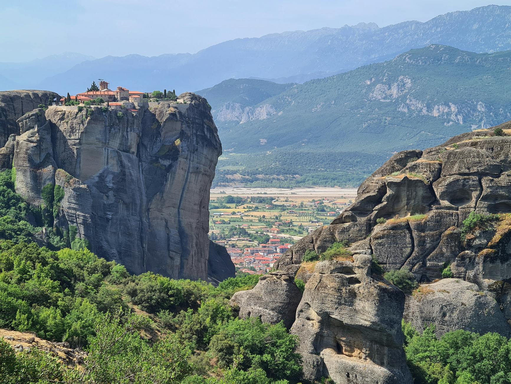 Meteora monasteries sitting atop towering sandstone pillars in central Greece