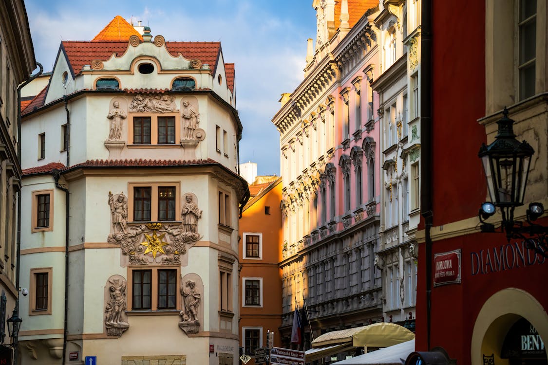 Ornate building facades along a historic street in Prague city center