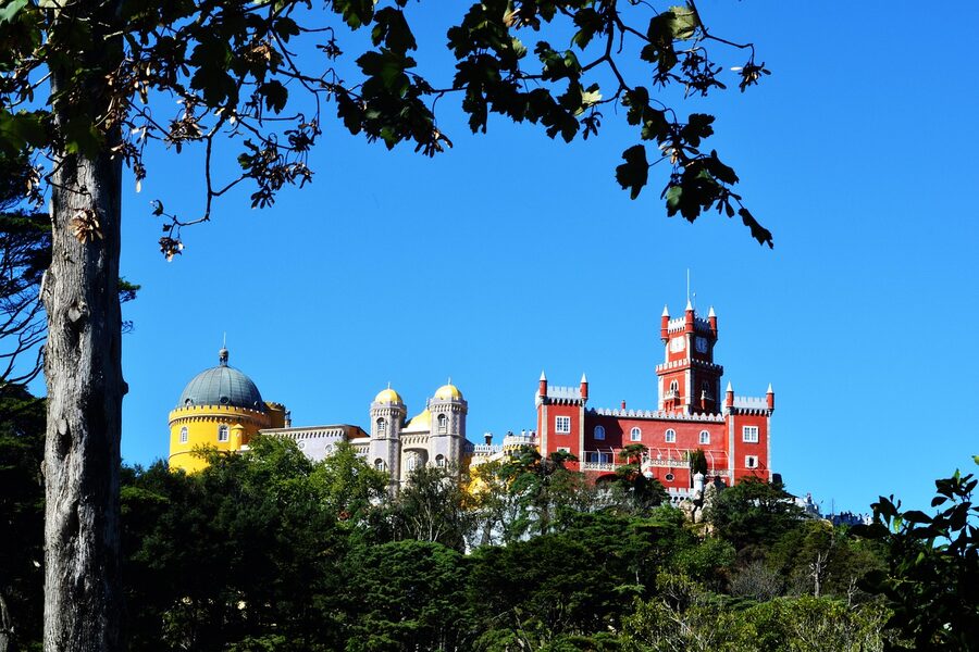 Pena Palace exterior view with yellow and red walls Sintra
