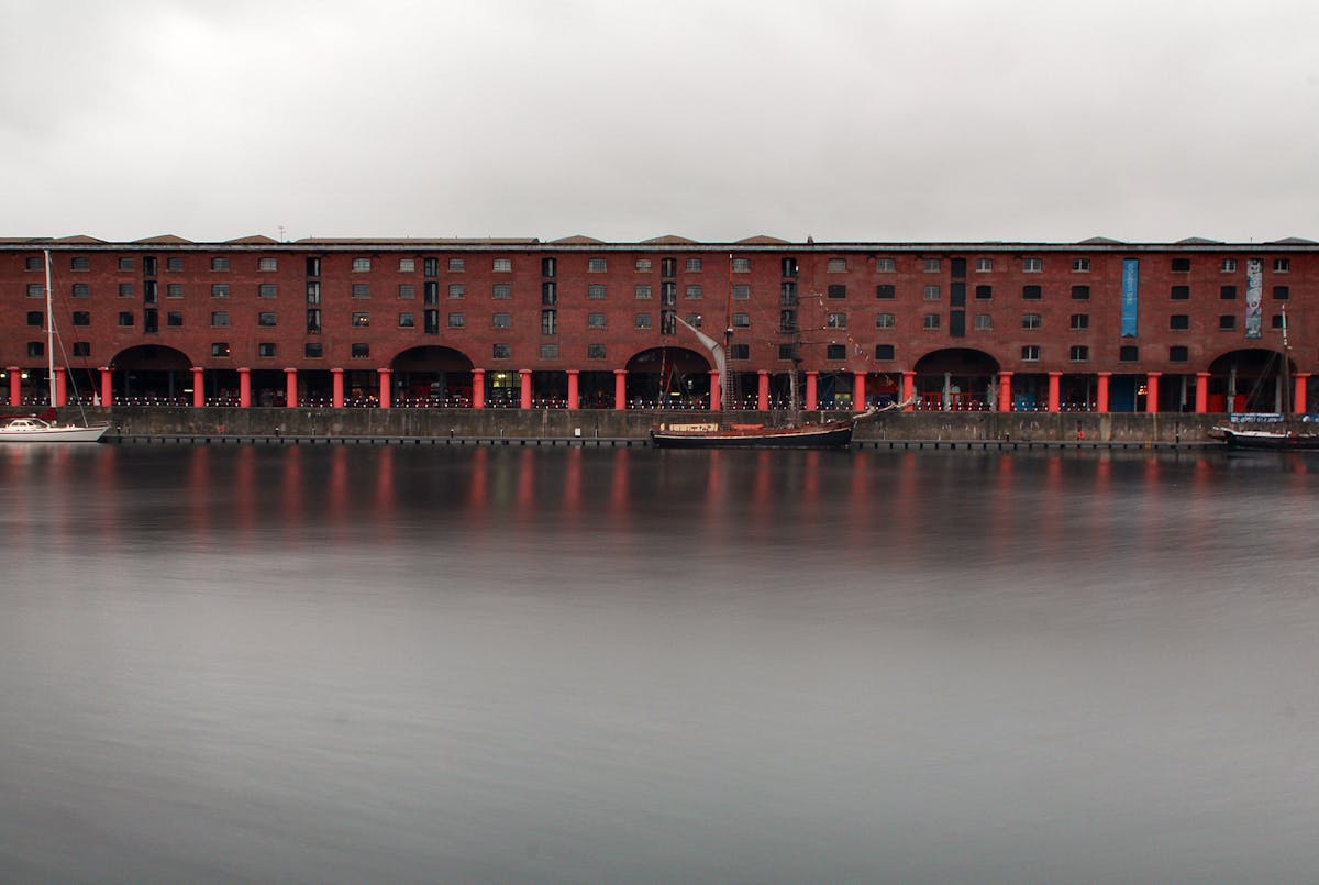 Historic Albert Dock architecture with columns along the Liverpool waterfront