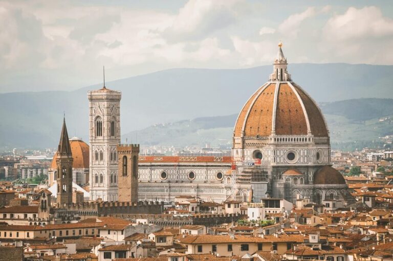 Florence Cathedral at dawn with the Duomo dome rising above the city skyline