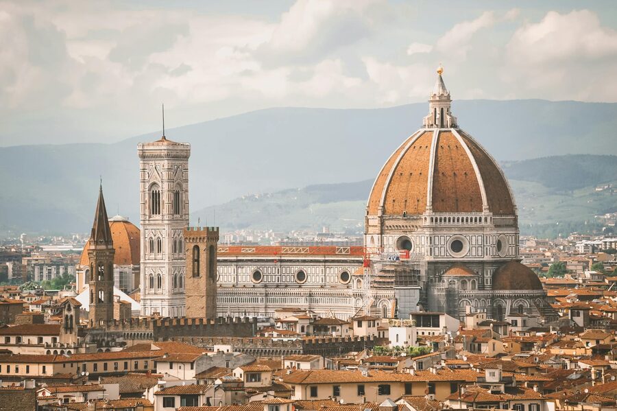 Florence Cathedral at dawn with the Duomo dome rising above the city skyline