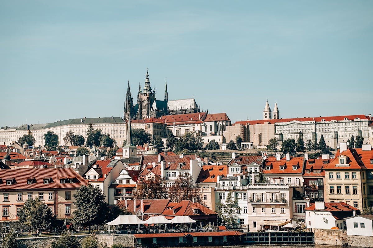 Prague Castle complex rising above the red rooftops of the Mala Strana district
