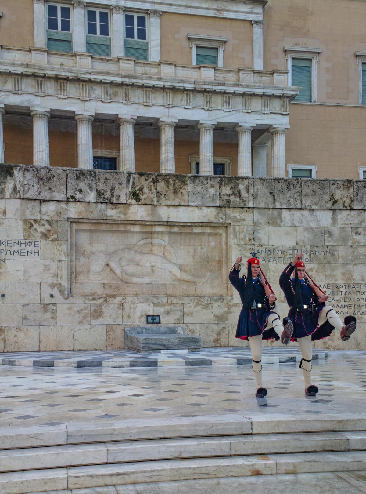 Evzones guards performing the ceremonial change of guard at the Greek Parliament in Athens