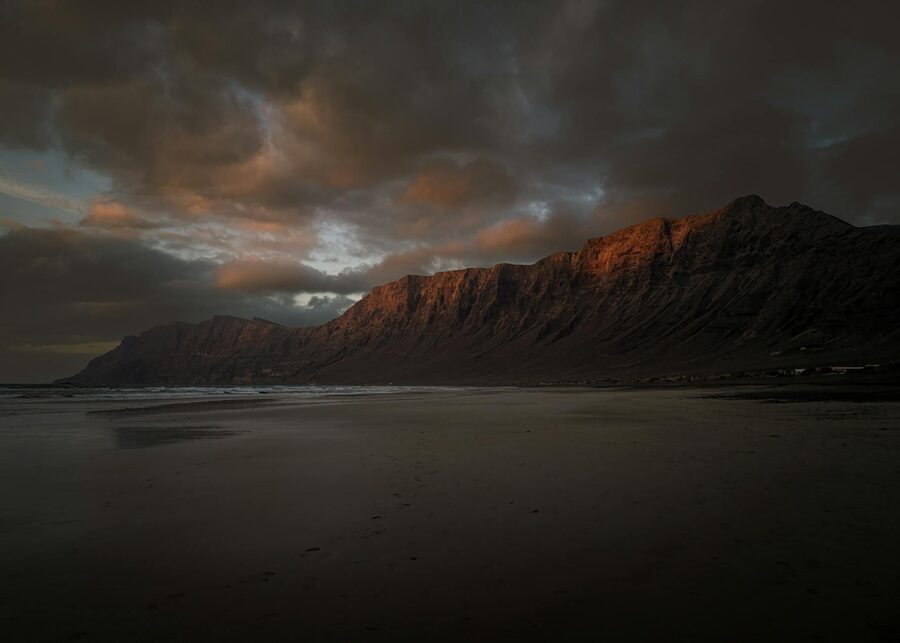 Dramatic sunset lighting on the Famara cliffs along the Lanzarote coastline