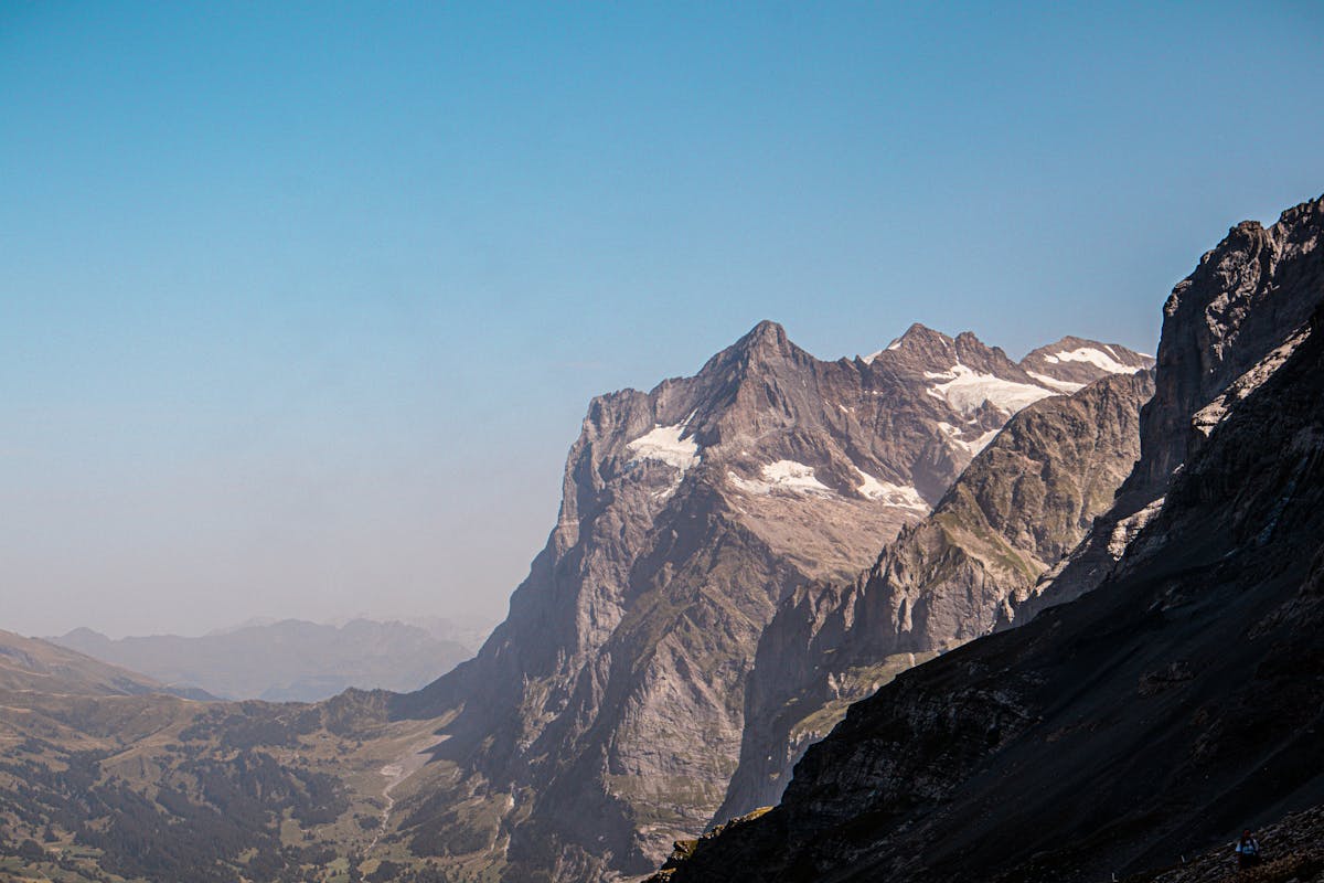 Snow-covered mountain peaks rising above Grindelwald valley in the Bernese Oberland