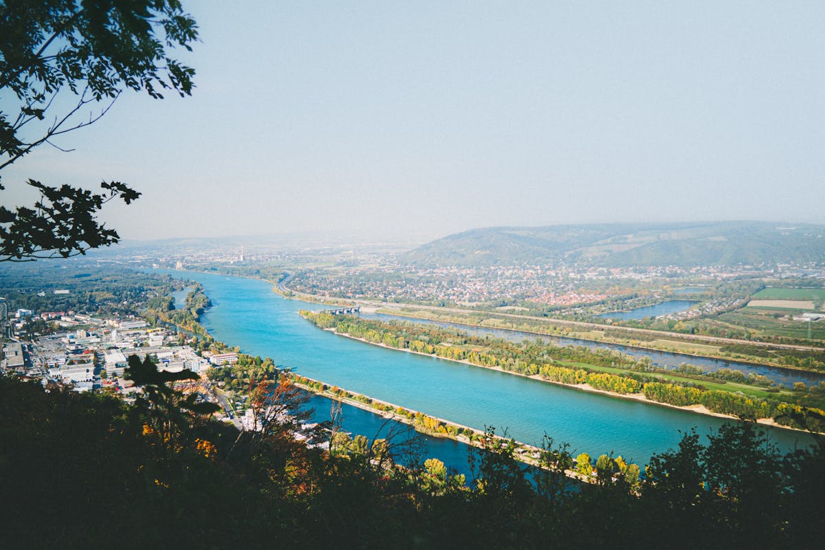 Scenic view of the Danube River from Kahlenberg Hill in Vienna with autumn foliage