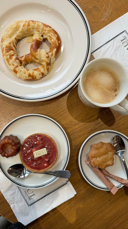 Fresh croissants and pastries with coffee at a traditional Lyon cafe