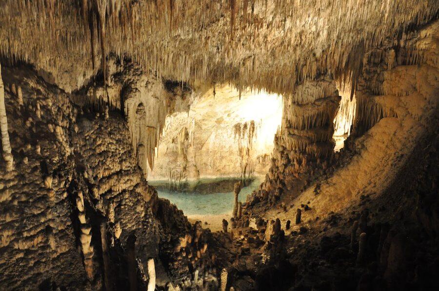 Rock formations and still waters inside a cave in Majorca