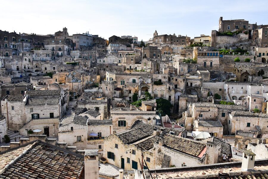 Ancient stone buildings cascading down the ravine in Matera Italy