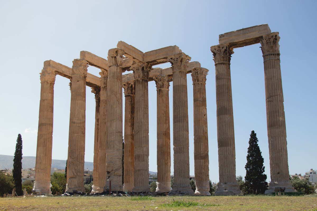 Temple of Olympian Zeus in Athens with ancient columns against blue sky