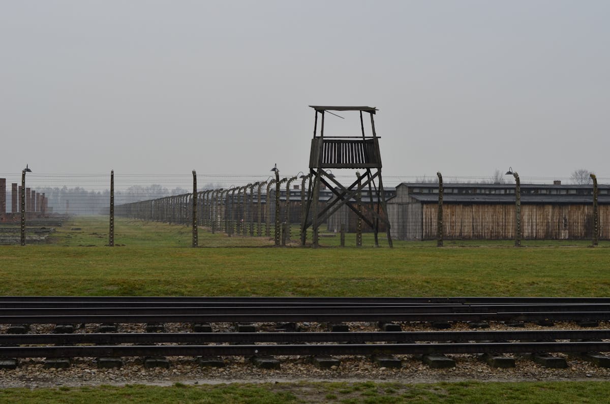 Watchtower and railway tracks at Auschwitz-Birkenau