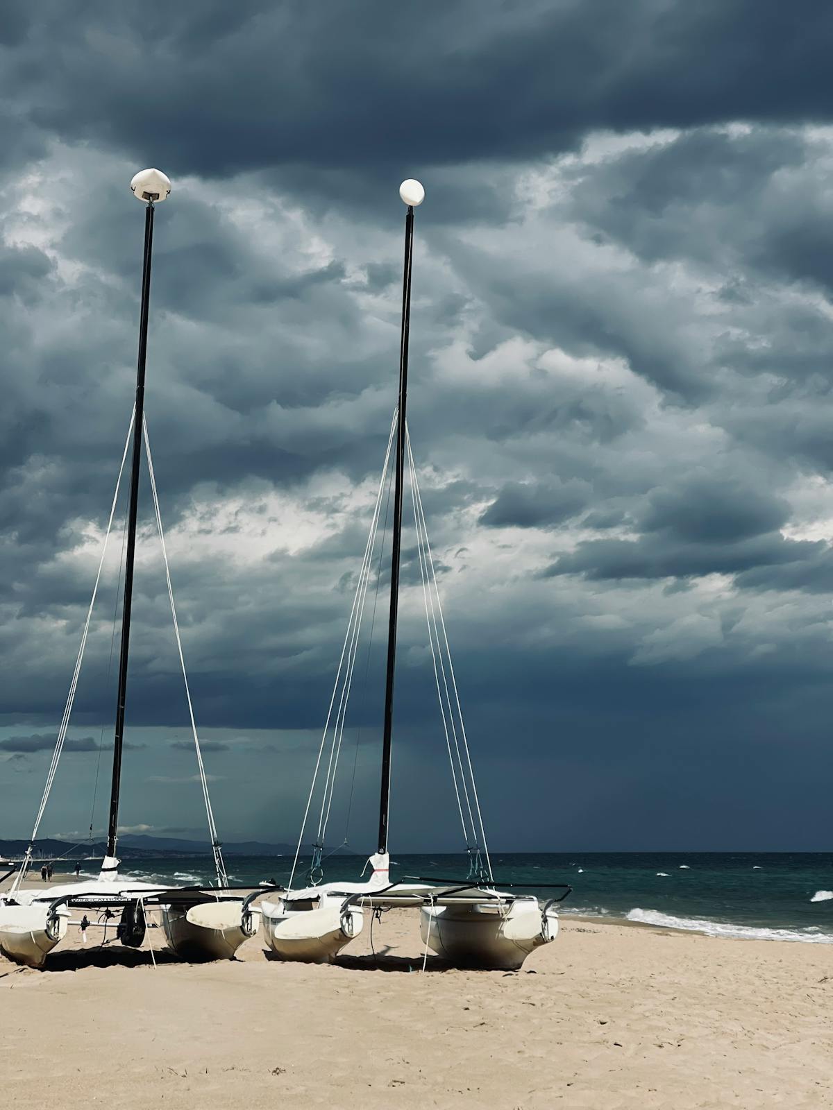 Ocean view with catamarans against blue skies