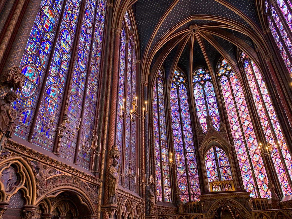 Close-up detail of the medieval stained glass craftsmanship in Sainte-Chapelle