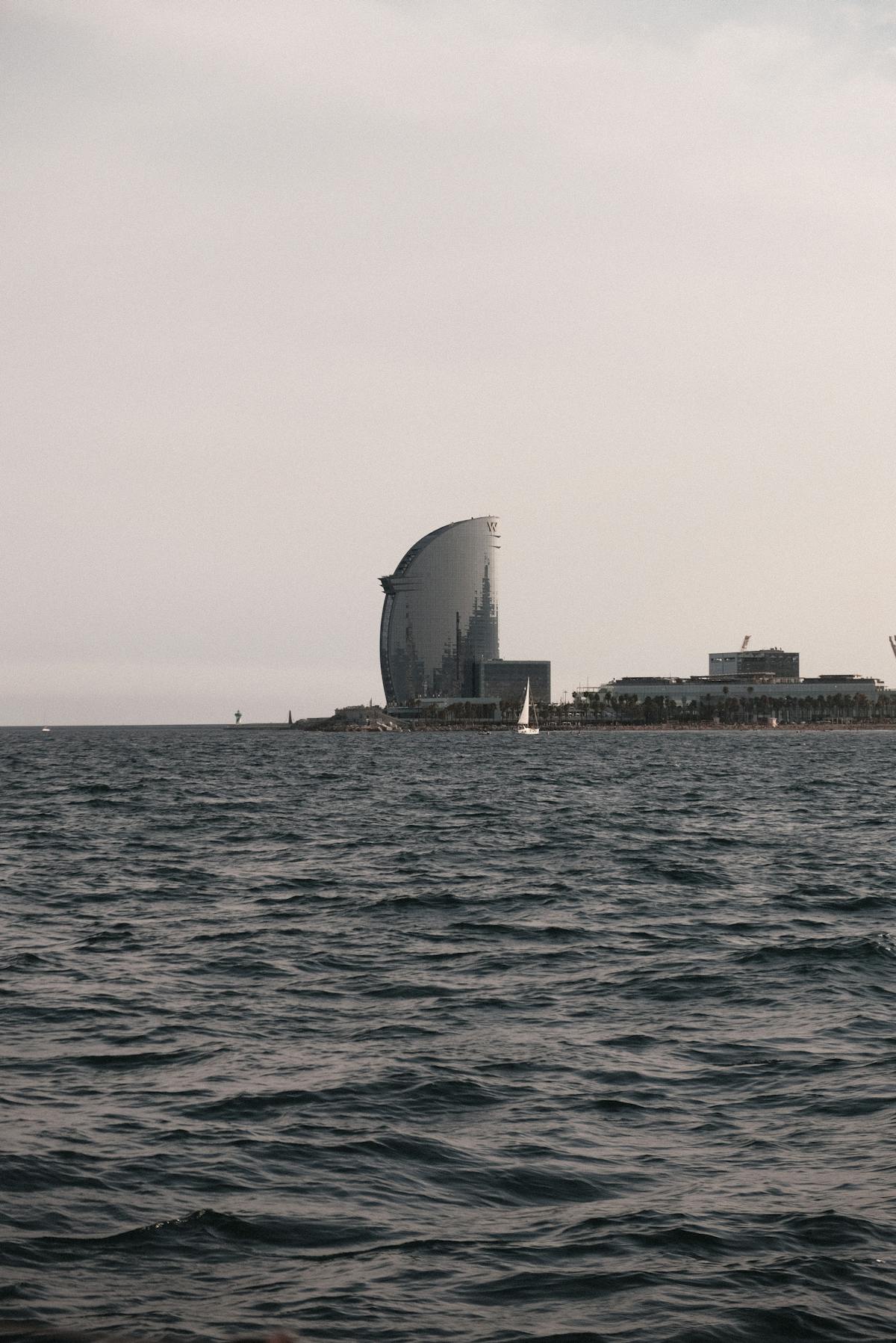 Sailboat near the W Hotel in Barcelona at sunset