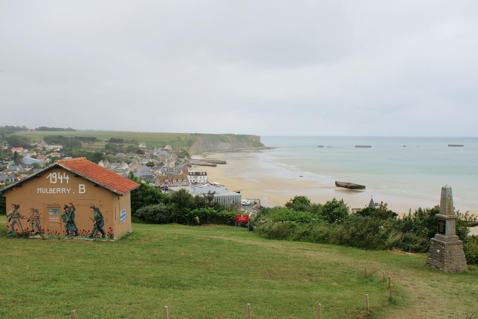Arromanches-les-Bains coastline with WWII Mulberry harbour remains