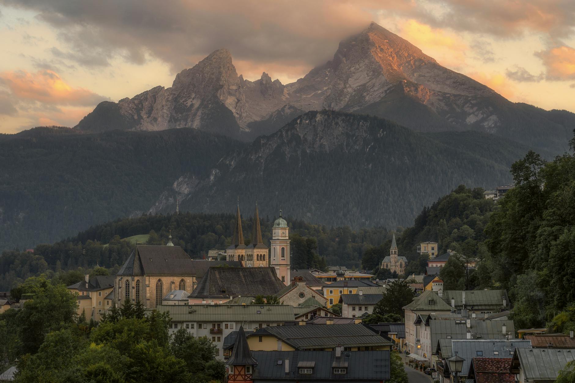 Berchtesgaden town center with Watzmann mountain glowing at sunset