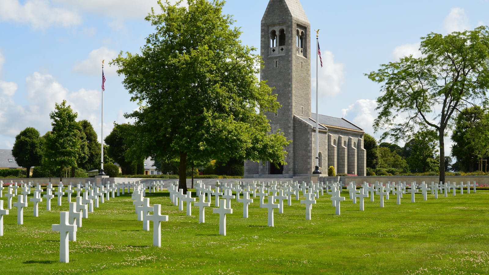 Memorial and rows of crosses at Normandy American Cemetery