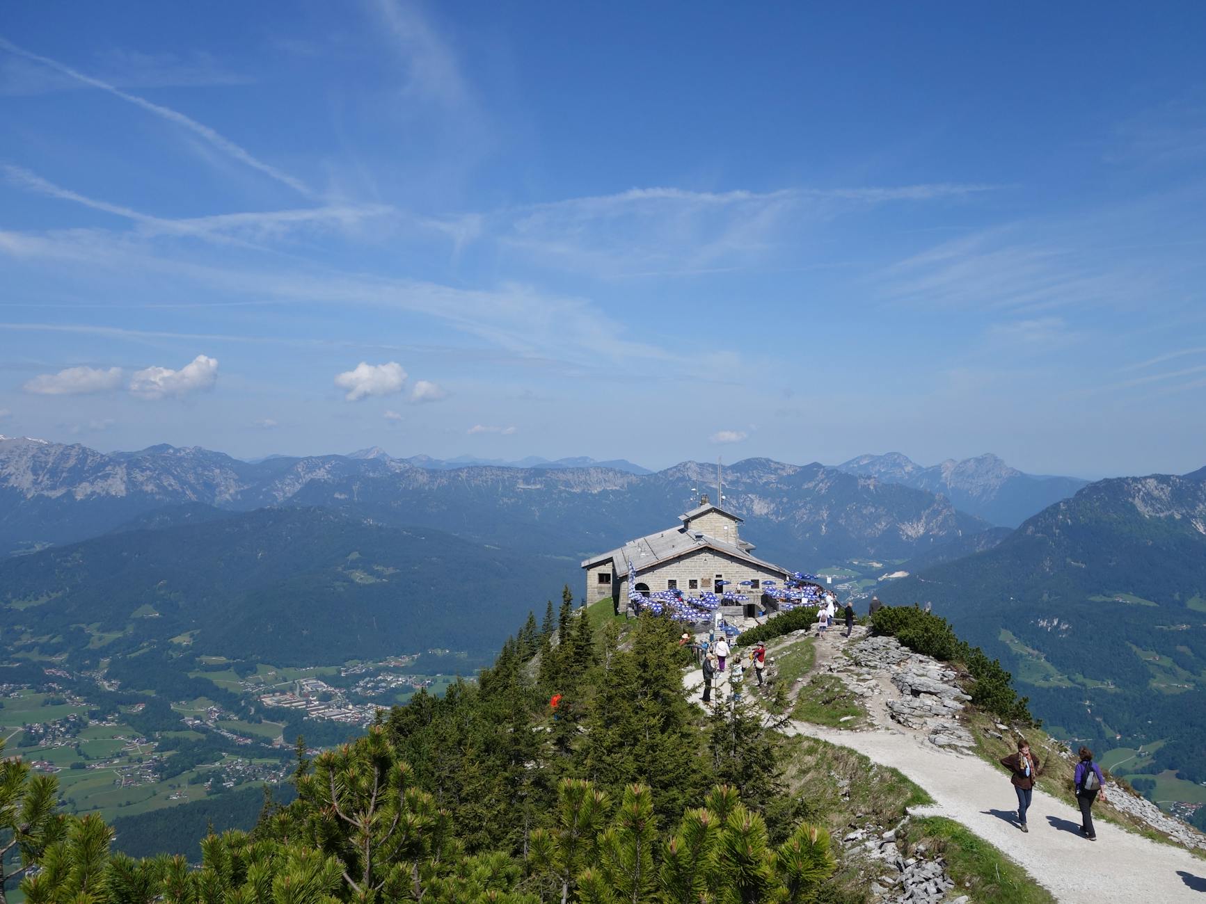 Eagle's Nest building sitting atop Kehlstein mountain surrounded by clouds