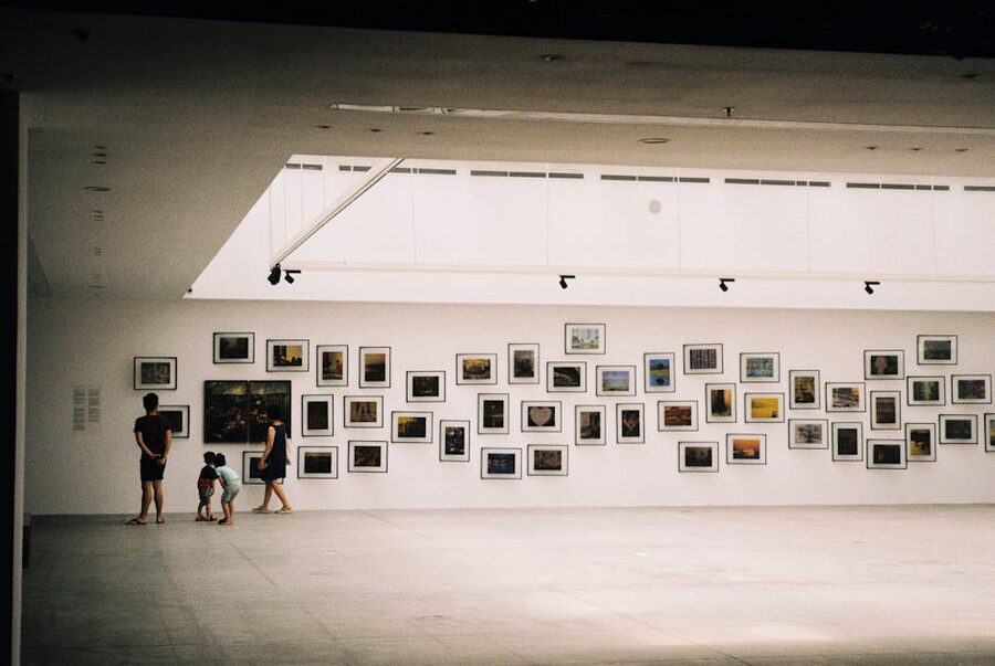 Family walking through museum exhibition together