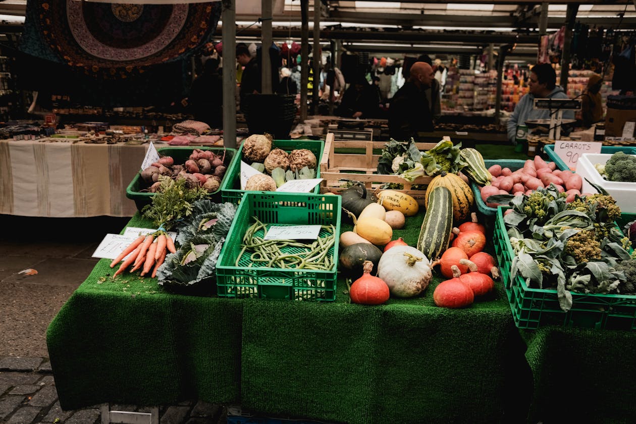 Colorful fresh vegetables at an outdoor market stall