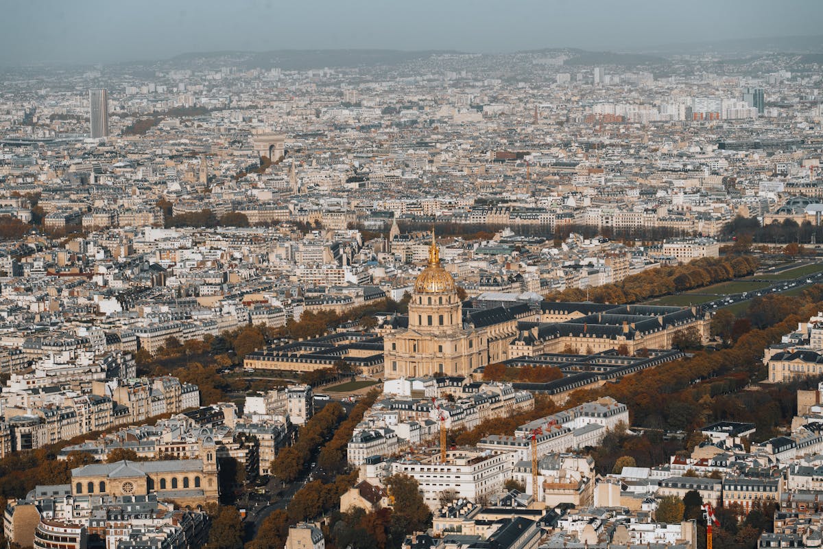Aerial view of Les Invalides dome amid the Paris cityscape