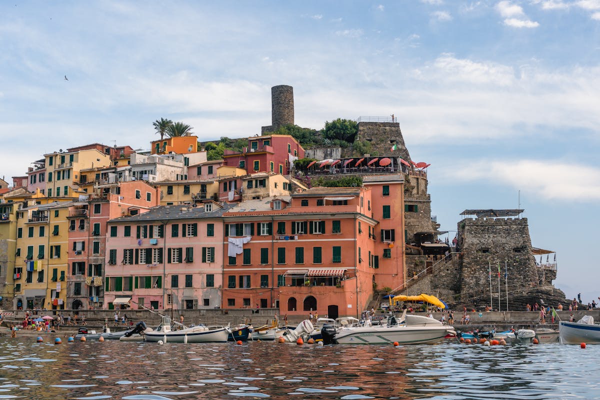 Colorful buildings and boats in the harbor of Vernazza Cinque Terre
