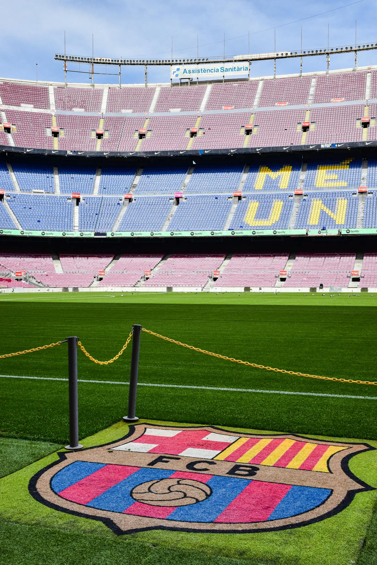 Wide view of Camp Nou stadium in Barcelona with the FCB logo visible on the football pitch