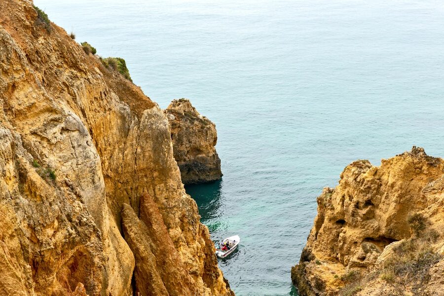 Stunning cliffs and serene ocean waters near Lagos in the Algarve region