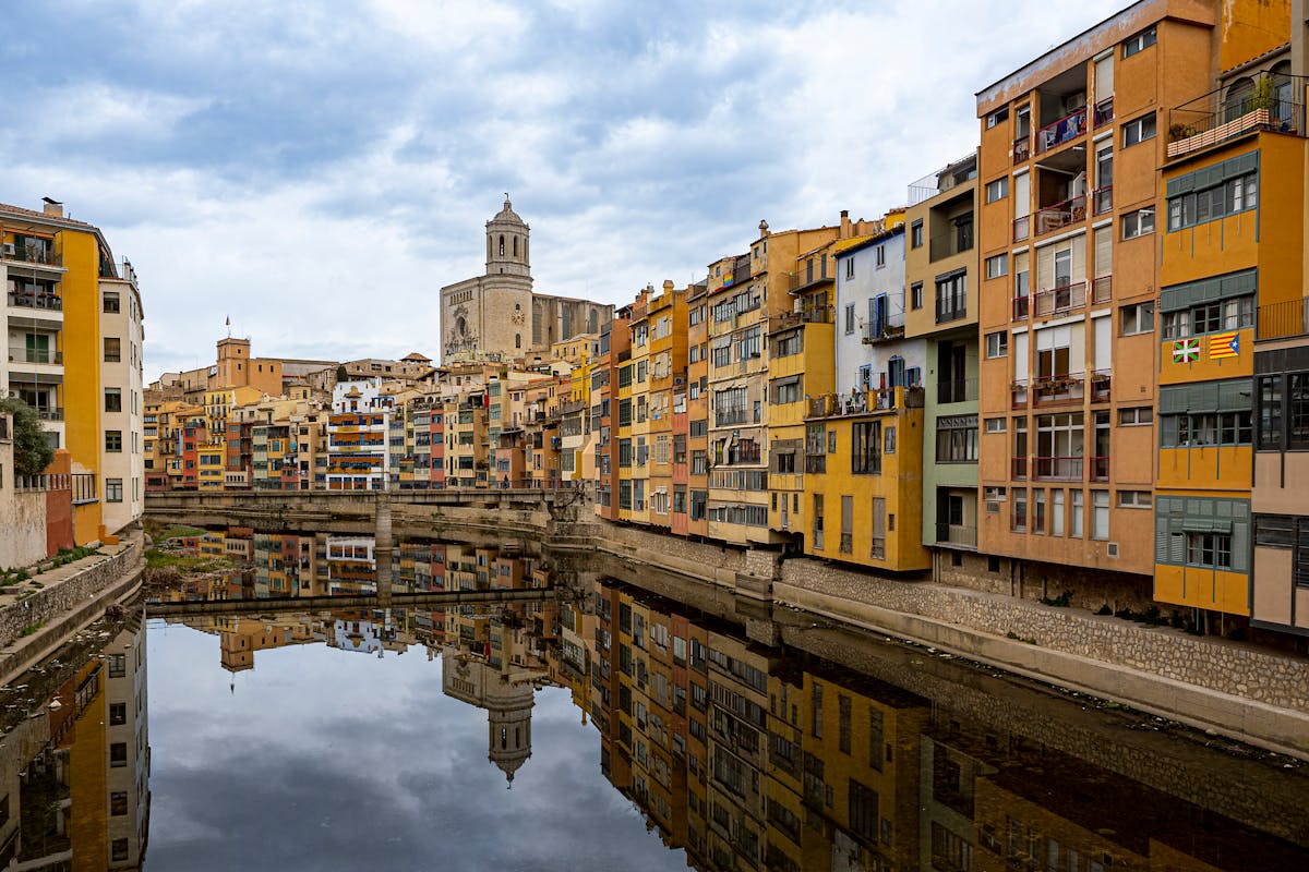 Colourful buildings along the Onyar River in Girona Spain