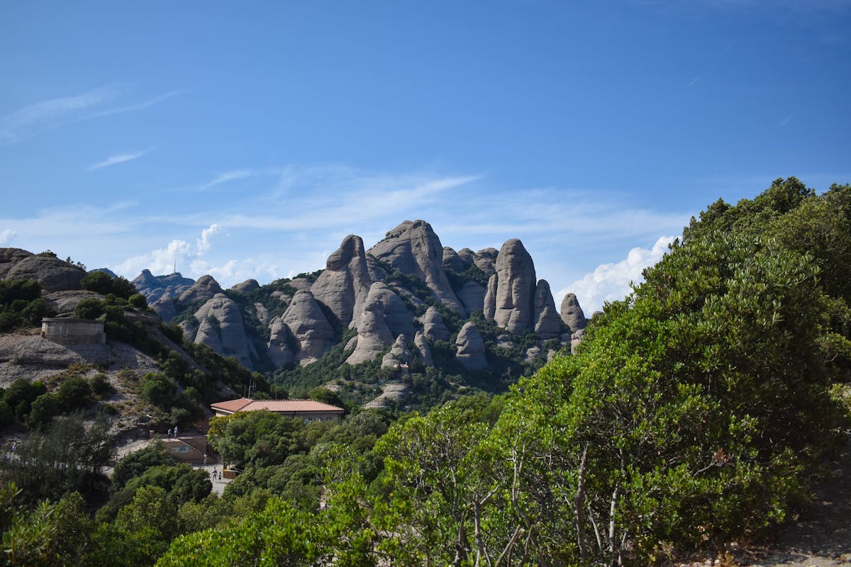 Jagged peaks of Montserrat mountain rising above the valley in Catalonia