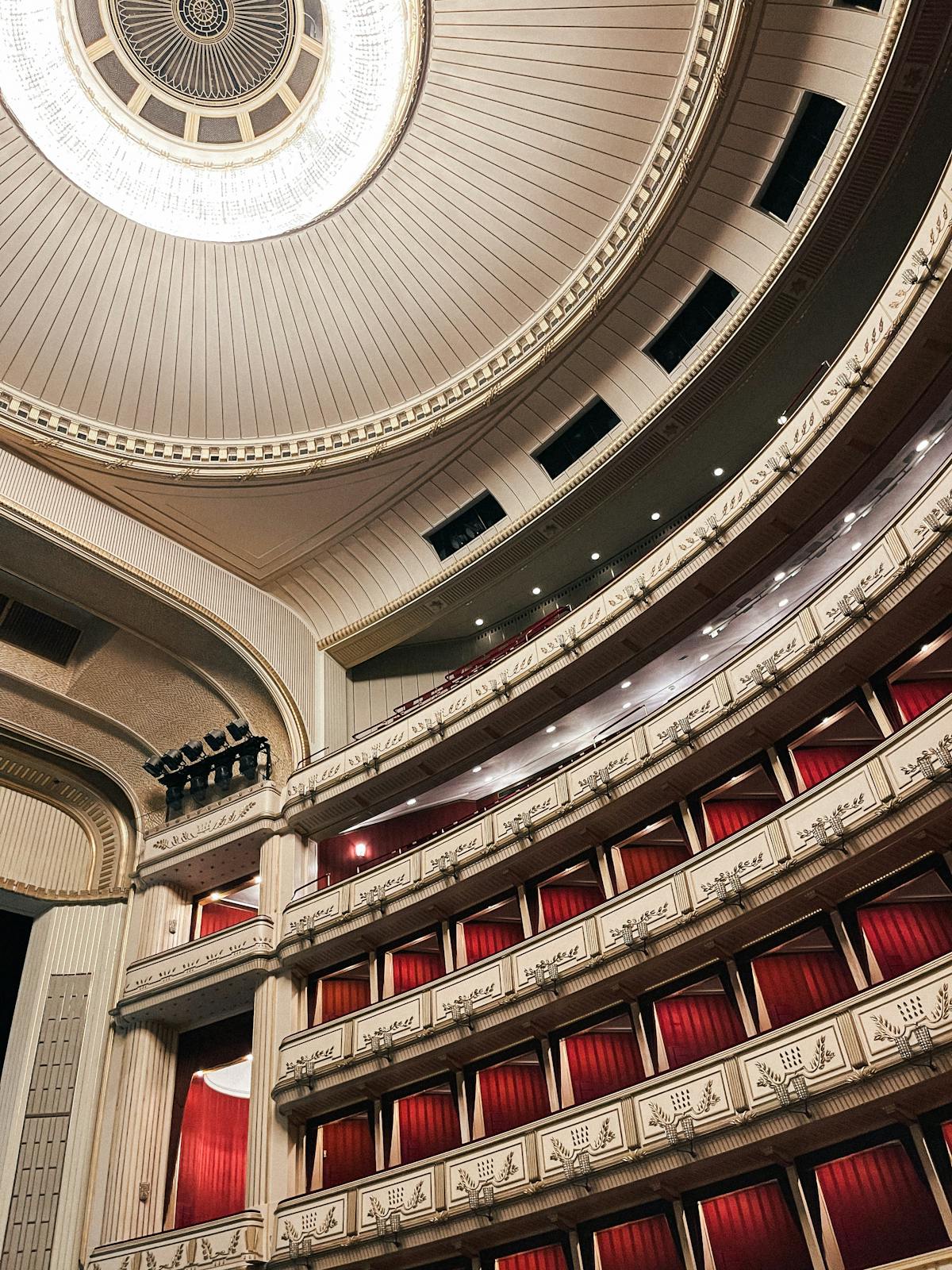 Interior of a Baroque church in Vienna with frescoes and golden ornamentation
